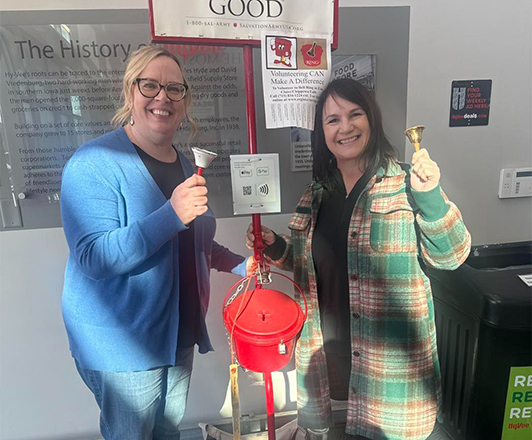 WNB coworkers pose for a picture while ringing bells for the Salvation Army in Altoona, Wisconsin.