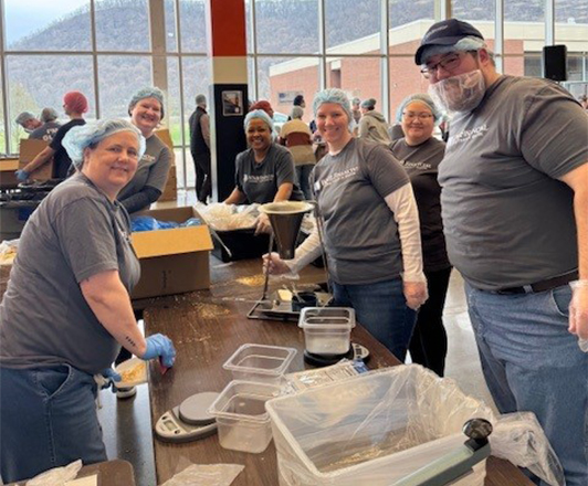 WNB coworkers volunteer at a local Feed My Starving Children food packing event in Winona.